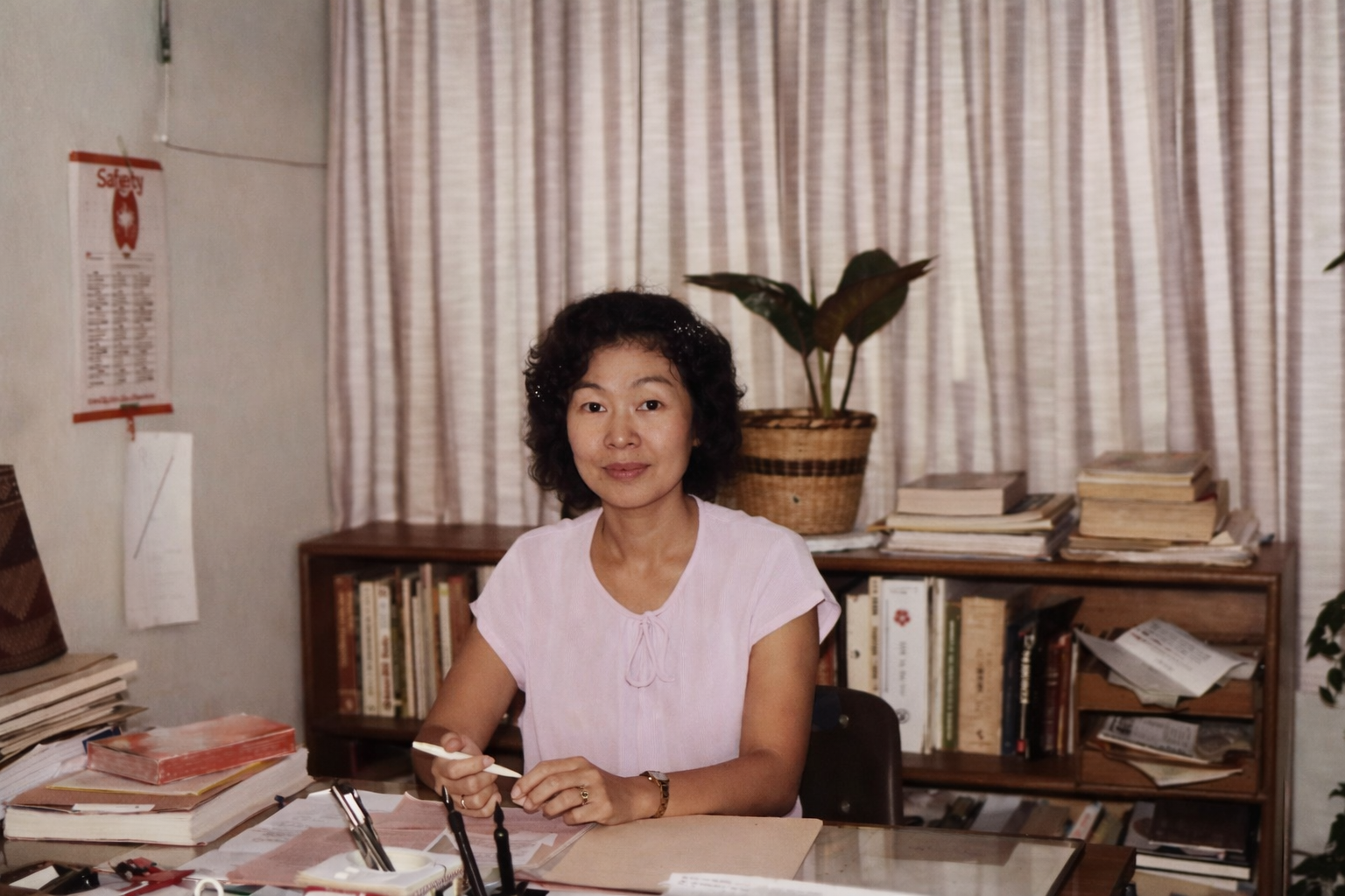 Victoria at a desk