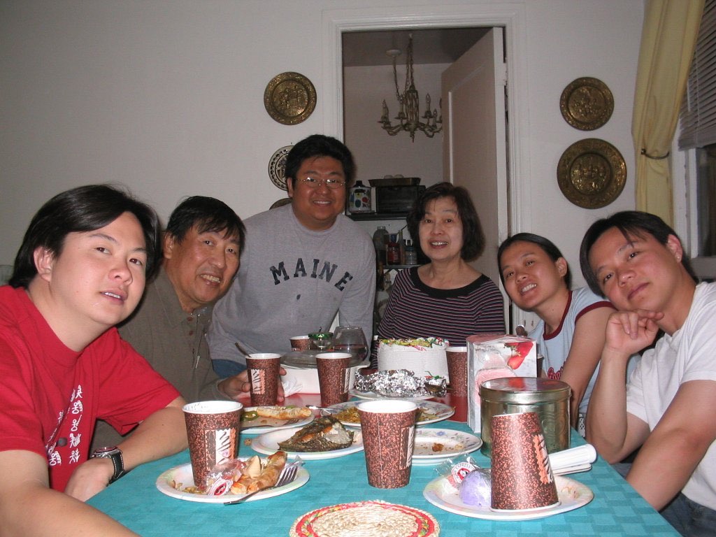 Family gathered around a table for a celebration