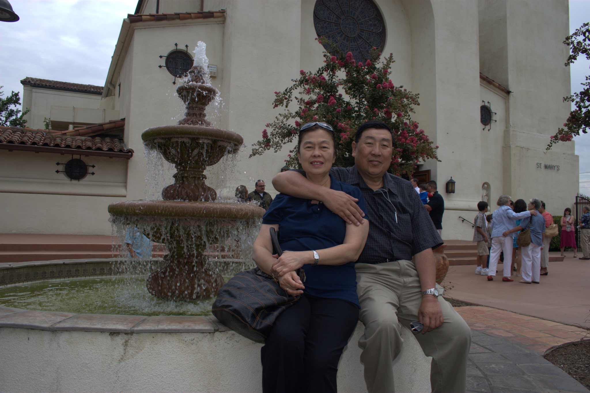 Mom and Dad smiling together outside St. Mary's church