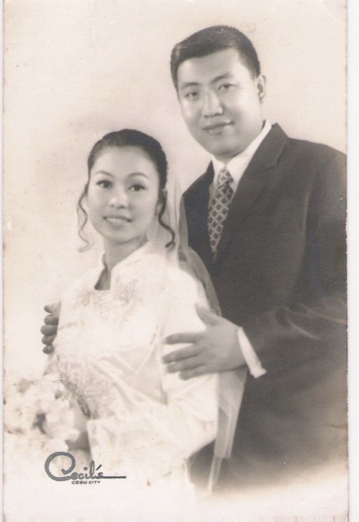 Vintage black-and-white wedding portrait of a bride and groom